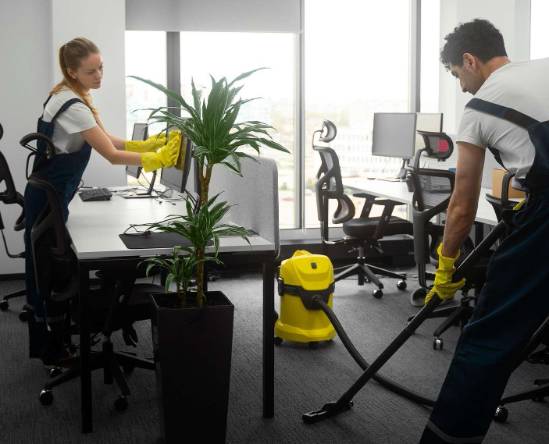 precise cleaning staff, happy, vacuuming shared workspace, co-working space with modern furniture